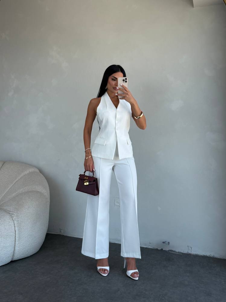 White vest and wide-leg trousers